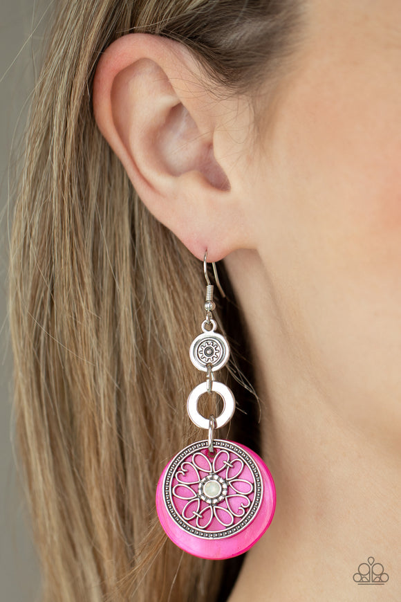 Royal Marina​ - Pink - Paparazzi Accessories -   Item #P5WH-PKXX-228XX Reminiscent of an eclipse, an airy silver ring radiating with ornate petals, sways in front of a pink shell-like disc. Silver rings in graduating sizes cascade from the top for a whimsically nautical look. Earring attaches to a standard fishhook fitting.  Sold as one pair of earrings.