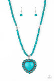 A Heart Of Stone - Blue - Paparazzi Accessories -   Item #P2SE-BLXX-436XX Bordered by dainty turquoise stones, an oversized turquoise stone heart pendant swings from the bottom of a turquoise stone and silver beaded display below the collar for a flirtatiously earthy fashion. Features an adjustable clasp closure.  Sold as one individual necklace. Includes one pair of matching earrings.  2021 LIFE OF THE PARTY (LOP) APRIL