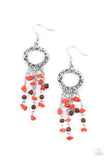 Primal Prestige - Red - Paparazzi Accessories -  Item #P5SE-RDXX-154XX Tapered tassels of dainty wooden beads and red pebbles stream from the bottom of a hammered silver hoop, creating an earthy fringe. Earring attaches to a standard fishhook fitting.  Sold as one pair of earrings.