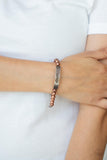 Mom Squad - Copper - Paparazzi Accessories -  Item #P9WD-CPXX-111XX Stamped in the word, "Mama," a curved copper plate attaches to strands of copper beads threaded along invisible wire around the wrist, creating a sentimental centerpiece. Features an adjustable clasp closure.  Sold as one individual bracelet. GREAT FOR MOTHERS DAY!