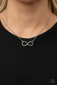 Forever Your Mom - White - Paparazzi Accessories -  Item #P2WD-WTXX-184XX A bright silver infinity symbol features the word "Mother" in filigree script across the bottom. A row of sparkly dainty rhinestones travels across the curve creating a lovingly charming sentiment as it connects to a dainty silver chain below the collar. Features an adjustable clasp closure.  Sold as one individual necklace. Includes one pair of matching earrings.