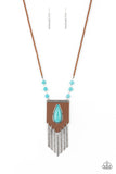 Enchantingly Tribal - Blue - Paparazzi Accessories - Item #P2SE-BLXX-453XX A bold blue teardrop stone encased in an antiqued silver frame is centered on a brown leather insignia-like pendant. Decorated with a silver plate embossed in geometric designs and a tinkling fringe of embossed silver plates suspended from the bottom, the pendant sways from lengthened leather cords accented with turquoise stone beads for an enchantingly timeless finish.