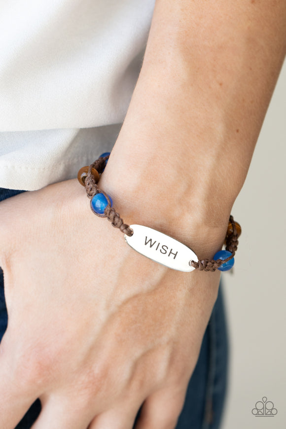 WISH This Way - Blue - Paparazzi Accessories -  Item #P9WD-URBL-187XX An oval silver plate engraved with the word 