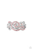 Melodic Motion - Pink - Paparazzi Accessories -   Item #P4RE-PKXX-232XX An ornamental silver scrollwork frame, adorned with dainty sparkling pink rhinestones travels across the finger in a melodic display. Features a dainty stretchy band for a flexible fit.  Sold as one individual ring.