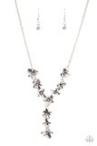 Fairytale Meadow - Purple - Paparazzi Accessories -  Item #P2WH-PRXX-395XX Dotted with dainty purple rhinestone centers, whimsical silver flowers delicately link into an extended pendant below the collar for an ethereal fashion. Features an adjustable clasp closure.  Sold as one individual necklace. Includes one pair of matching earrings.