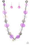 Seashore Spa - Purple - Paparazzi Accessories -  Item #P2SE-PRXX-188XX Infused with hammered silver discs, an assortment of purple and white shell-like discs are knotted in place along a gray cord, creating a summery display across the chest. Features an adjustable clasp closure.  Sold as one individual necklace. Includes one pair of matching earrings.