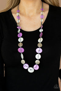 Seashore Spa - Purple - Paparazzi Accessories -  Item #P2SE-PRXX-188XX Infused with hammered silver discs, an assortment of purple and white shell-like discs are knotted in place along a gray cord, creating a summery display across the chest. Features an adjustable clasp closure.  Sold as one individual necklace. Includes one pair of matching earrings.