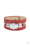 Ultra Urban - Red - Paparazzi Accessories -  Item #P9UR-RDXX-133XX A white rhinestone silver centerpiece is studded in place by white rhinestone encrusted silver studs across the spliced center of a red leather band, creating a glittery urban look around the wrist. Features an adjustable snap closure.  Sold as one individual bracelet.