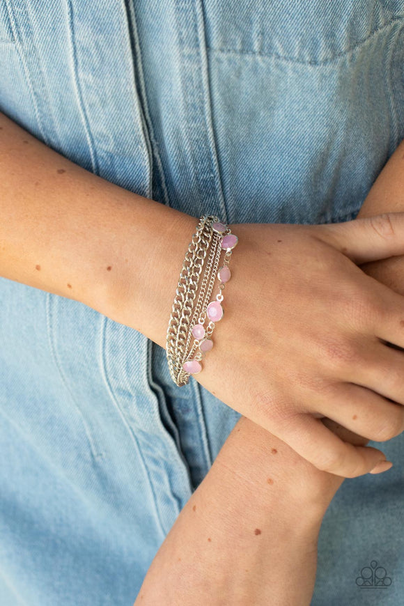 Glossy Goddess - Pink Item #P9WH-PKXX-270BC Infused with glassy Pale Rosette beaded strands, layers of mismatched silver chains drape around the wrist for an ethereal pop of color. Features an adjustable clasp closure.  Sold as one individual bracelet.