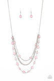 Goddess Getaway - Pink - Paparazzi Accessories -  Item #P2WH-PKXX-426BC Infused with glassy Pale Rosette beaded strands, layers of mismatched silver chains drape below the collar for an ethereal pop of color. Features an adjustable clasp closure.  Sold as one individual necklace. Includes one pair of matching earrings.