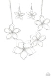 Flower Garden Fashionista - Silver - Paparazzi Accessories -  Item #P2ST-SVXX-173XX Shiny silver wire delicately twists into oversized blossoms. Varying in size, the airy floral frames delicately link into an asymmetrical display as the layered frames elegantly pop beneath the collar. Features an adjustable clasp closure.  Sold as one individual necklace. Includes one pair of matching earrings.