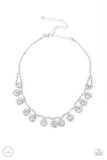 Princess Prominence - White - Paparazzi Accessories -  Item #P2CH-WTXX-051XX A dainty strand of glittery white rhinestones encircle solitaire white rhinestones around the neck, creating a glitzy fringe. Features an adjustable clasp closure.  Sold as one individual choker necklace. Includes one pair of matching earrings.