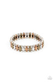 Abstract Advisory - Multi - Paparazzi Accessories -  Item #P9SE-MTXX-160XX Brushed in an antiqued shimmer, pairs of dainty silver beads flank diamond shaped brass, copper, and silver beads along stretchy bands around the wrist for a rustic fashion.  Sold as one individual bracelet.