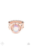 Mystical Treasure - Rose Gold - Paparazzi Accessories -   Item #P4RE-GDRS-249DV Interwoven rose gold bars delicately encircle an iridescent Pale Rosette gem, creating a mystical centerpiece atop the finger. Features a stretchy band for a flexible fit.  Sold as one individual ring.