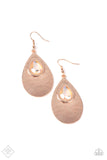 Tranquil Trove - Rose Gold - Paparazzi Accessories -   Item #P5RE-GDRS-257DV A shiny rose gold teardrop is hammered in texture, creating a radiant display as the light bounces off each beveled surface. A faceted iridescent teardrop gem with Pale Rosette undertones is pressed into the top of the rose gold frame in an enchanting finish. Earring attaches to a standard fishhook fitting.  Sold as one pair of earrings.