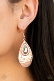 Tranquil Trove - Rose Gold - Paparazzi Accessories -   Item #P5RE-GDRS-257DV A shiny rose gold teardrop is hammered in texture, creating a radiant display as the light bounces off each beveled surface. A faceted iridescent teardrop gem with Pale Rosette undertones is pressed into the top of the rose gold frame in an enchanting finish. Earring attaches to a standard fishhook fitting.  Sold as one pair of earrings.