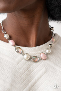 Nautical Nirvana - Pink - Paparazzi Accessories -  Item #P2RE-PKXX-348EO A collection of classic white pearls, iridescent Pale Rosette beads, white emerald cut gems, and iridescent crystal-like teardrops dance below the collar for an ethereal display. Shiny silver frames encase each bead, adding a romantic vibe to the vintage inspired design. Features an adjustable clasp closure.  Sold as one individual necklace. Includes one pair of matching earrings.