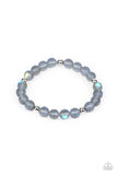 Forever and a DAYDREAM - Silver - Paparazzi Accessories -  Item #P9SE-URSV-200XX Infused with silver accents, a dreamy collection of iridescent rainbow specked beads are threaded along a stretchy band around the wrist for an enchanting glow.  Sold as one individual bracelet.