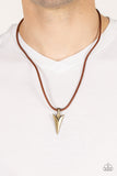 Pharaohs Arrow - Brass - Paparazzi Accessories -  Item #P2MN-URBR-020XX A brass arrowhead inspired pendant glides along a leathery brown cord below the collar, creating authentic edge. Features an adjustable clasp closure.  Sold as one individual necklace.