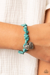 Love You to Pieces​ - Blue - Paparazzi Accessories -  Item #P9SE-BLXX-387XX Infused with a hammered silver bead and a decorative silver heart charm, an earthy collection of turquoise pebbles are threaded along a stretchy band around the wrist for a whimsical fashion.  Sold as one individual bracelet.