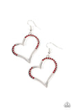 Tenderhearted Twinkle - Red - Paparazzi Accessories -  Item #P5WH-RDXX-157XX A curvaceous silver heart is encrusted in sections of fiery red rhinestones, invoking a flirtatious flair. Earring attaches to a standard fishhook fitting.  Sold as one pair of earrings.