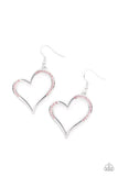 Tenderhearted Twinkle - Pink - Paparazzi Accessories -  Item #P5WH-PKXX-266XX A curvaceous silver heart is encrusted in sections of glittery pink rhinestones, invoking a flirtatious flair. Earring attaches to a standard fishhook fitting.  Sold as one pair of earrings.