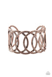 Circa de Contender - Copper - Paparazzi Accessories -  Etched and hammered in linear and diamond-cut shimmer, glistening copper circles join into a dramatic cuff around the wrist.  Sold as one individual bracelet.