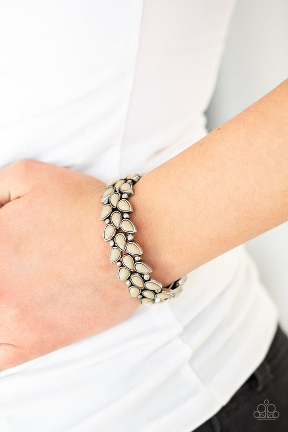 Vintage Venture - Brown - Paparazzi Accessories -  Faceted brown teardrop beads and shimmery silver studs coalesce into ornate frames. The whimsical frames are threaded along stretchy bands around the wrist for a seasonal look.  Sold as one individual bracelet.