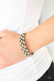 Vintage Venture - Brown - Paparazzi Accessories -  Faceted brown teardrop beads and shimmery silver studs coalesce into ornate frames. The whimsical frames are threaded along stretchy bands around the wrist for a seasonal look.  Sold as one individual bracelet.