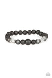 Strength - Black - Paparazzi Accessories Infused with dainty silver accents, a collection of faceted cube beads, refreshing stone beads, and earthy lava rock beads are threaded along a stretchy band around the wrist for a seasonal look.  Sold as one individual bracelet.  P9SE-URBK-375XX