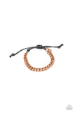 Goal! - Copper - Paparazzi Accessories  Shiny black cording knots around the ends of a copper beveled cable chain that is wrapped across the top of the wrist for a versatile look. Features an adjustable sliding knot closure.  Sold as one individual bracelet.  P9MN-URCP-001XX