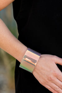 Holographic Aura - Multi - Paparazzi Accessories  Featuring a holographic shimmer, a thick multicolored acrylic cuff wraps around the wrist for a retro inspired fashion.  Sold as one individual bracelet.