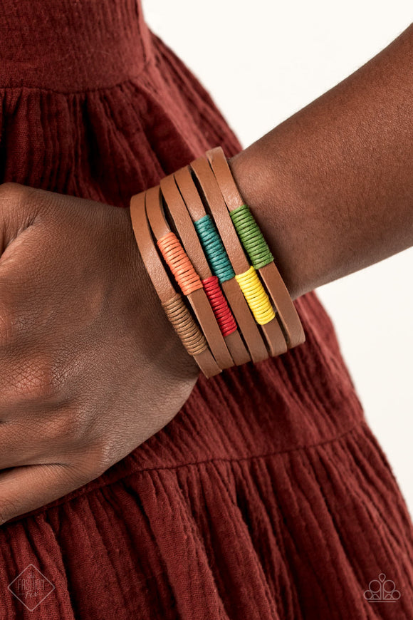 Country Colors - Multi - Paparazzi Accessories Item #P9SE-MTXX-143WB A brown leather band has been spliced into layered rows that wrap around the wrist. Multicolored threaded accents wrap around the leather strips, creating a colorfully rustic display. Features an adjustable snap closure.  Sold as one individual bracelet.  September 2020 Fashion Fix