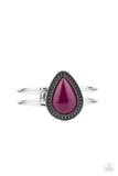 Over The Top Pop - Purple - Paparazzi Accessories  Item #P9WH-PRXX-229XX A shiny Magenta Purple teardrop bead is pressed into the center of a studded silver frame atop an airy silver cuff, creating a vibrant pop of color around the wrist. Features a hinged closure.  Sold as one individual bracelet.