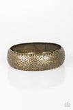 Garden Villa - Brass - Paparazzi Accessories -  Item #P9BA-BRXX-027XX Brushed in an antiqued finish, a rosy floral pattern is embossed across a thick brass bangle for a seasonal flair.  Sold as one individual bracelet.