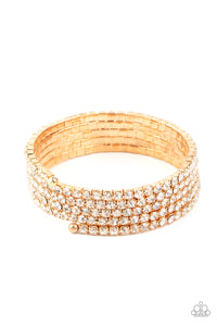 The GLOW-Digger - Gold - Paparazzi Accessories -   Item #P9RE-GDXX-285XX Encased in glistening gold fittings, row after row of glassy white rhinestones coil around the wrist, creating a blinding infinity wrap bracelet.  Sold as one individual bracelet.