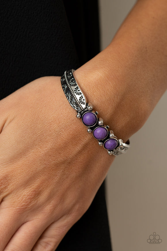 Mojave Glyphs - Purple - Paparazzi Accessories -  Item #P9SE-PRXX-112XX A trio of vivacious purple stones are encrusted along the center of a dainty silver studded cuff stamped in tribal inspired details for a seasonal flair.  Sold as one individual bracelet.