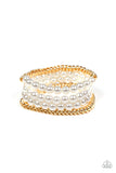 Industrial Incognito - Gold - Paparazzi Accessories -  Item #P9RE-GDXX-184XX A collection of pearly white beads and glistening gold chains are threaded along stretchy bands, creating a bold collision of industrial glamour.  Sold as one set of four bracelets.