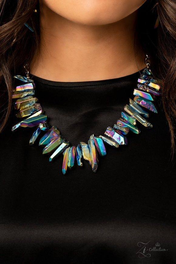 Charismatic - 2020 Zi - Paparazzi Accessories -  Featuring an oil spill iridescence, raw cut pieces of hematite are threaded along an invisible wire below the collar for a colorfully courageous look. Features an adjustable clasp closure.  Sold as one individual necklace. Includes one pair of matching earrings.