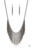 Cue The Fireworks - Multi/Gunmetal/Oil-spill - Paparazzi Accessories - Item #P2ST-MTXX-059XX Sporadically dotted in oil spill crystals, a mismatched collection of shimmery gunmetal chains swings from the bottom a classic gunmetal chain below the collar, creating a tapered fringe. Features an adjustable clasp closure.  Sold as one individual necklace at DeesBlings.com - Affordable Fashion Jewelry that is Lead and Nickel free. Includes one pair of matching earrings.