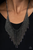 Cue The Fireworks - Multi/Gunmetal/Oil-spill - Paparazzi Accessories - Item #P2ST-MTXX-059XX Sporadically dotted in oil spill crystals, a mismatched collection of shimmery gunmetal chains swings from the bottom a classic gunmetal chain below the collar, creating a tapered fringe. Features an adjustable clasp closure.  Sold as one individual necklace at DeesBlings.com - Affordable Fashion Jewelry that is Lead and Nickel free. Includes one pair of matching earrings.