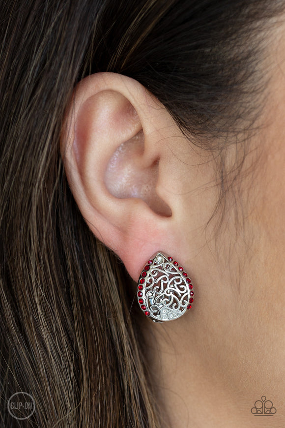 Garden Date - Clip-On - Red - Paparazzi Accessories -   Trimmed in fiery red rhinestones, vine-like filigree climbs a dainty silver teardrop for a whimsical look. Earring attaches to a standard clip-on fitting.  Sold as one pair of clip-on earrings by DeesBlings.com - Affordable Fashion Jewelry that is Lead and Nickel free.