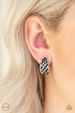 Sparkling Shells - Clip-On- Black - Paparazzi Accessories -  #P5CO-BKXX-048XX  Rows of glittery black rhinestones slant across rows of a shimmery silver frame for a refined look. Earring attaches to a standard clip-on fitting.  Sold as one pair of clip-on earrings by DeesBlings.com - Affordable Fashion Jewelry that is Lead and Nickel free.