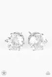Just In TIMELESS - White - Paparazzi Accessories -  P5PO-WTXX-076XX  A sparkling white rhinestone is nestled inside a classic silver frame for a timeless look. Earring attaches to a standard post fitting.  Sold as one pair of post earrings by DeesBlings.com - Affordable Fashion Jewelry that is Lead and Nickel free.