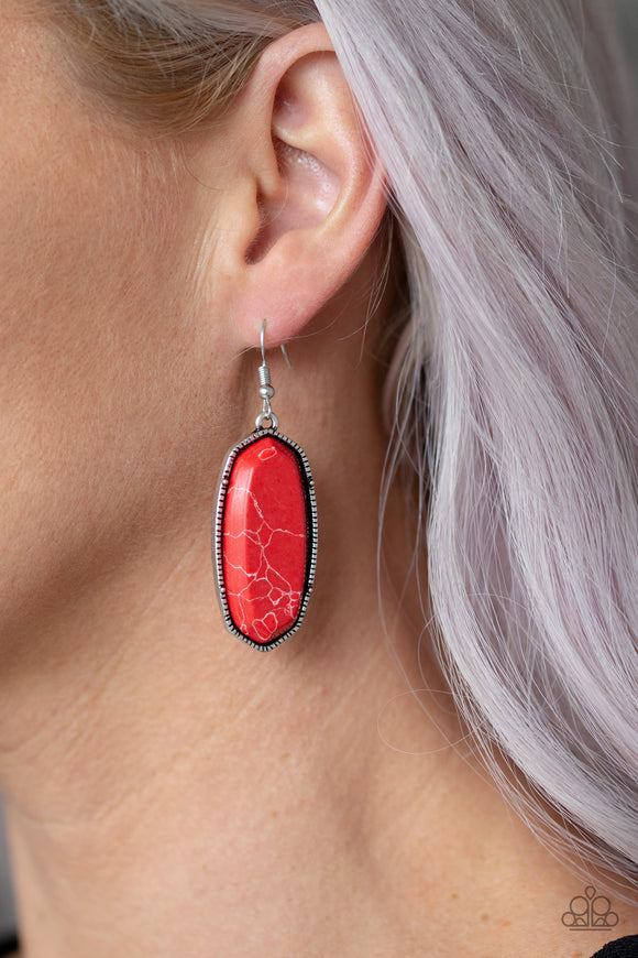 Stone Quest - Red - Paparazzi Accessories  Featuring a faux marble finish, a fiery red stone is pressed into a studded silver frame for a seasonal flair. As the stone elements in this piece are natural, some color variation is normal. Earring attaches to a standard fishhook fitting.  Sold as one pair of earrings.