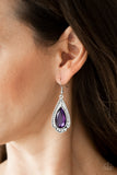 Superstar Stardom - Purple - Paparazzi Accessories Featuring a regal teardrop cut, a purple gem is pressed into a silver spade shape frame radiating with glassy white rhinestones for a refined look. Earring attaches to a standard fishhook fitting.  Sold as one pair of earrings.