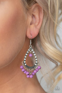 Positively Prismatic - Purple - Paparazzi Accessories  Dainty purple beads dangle from the bottom of a silver teardrop frame encrusted in glassy white rhinestones and silver studs for a colorful look. Earring attaches to a standard fishhook fitting.  Sold as one pair of earrings.