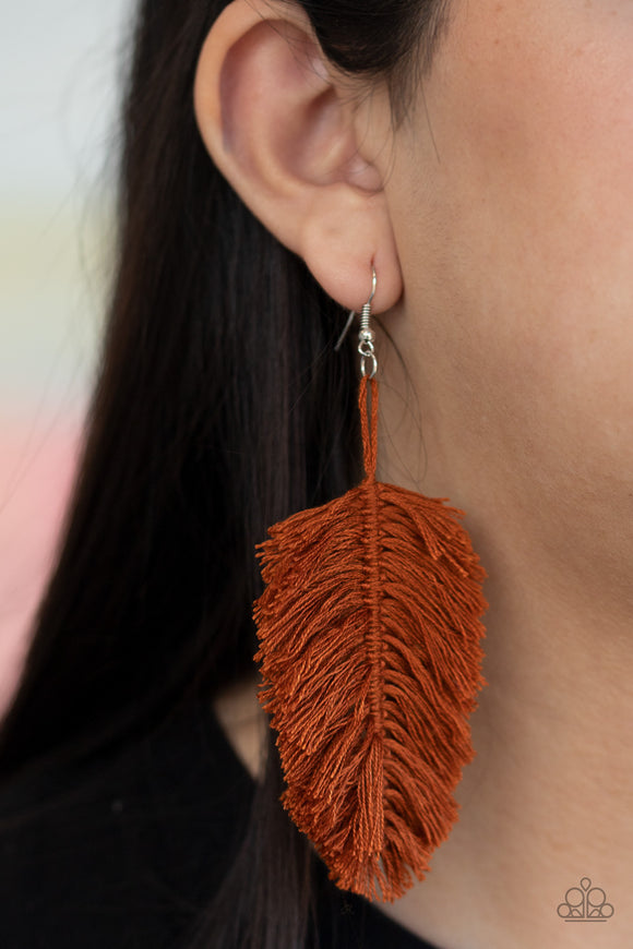 Hanging by a Thread - Brown Featuring an earthy brown hue reminiscent of terracotta, a loop of thread gives way to a leafy brown fringe, creating a statement-making texture. Earring attaches to a standard fishhook fitting.  Sold as one pair of earrings.