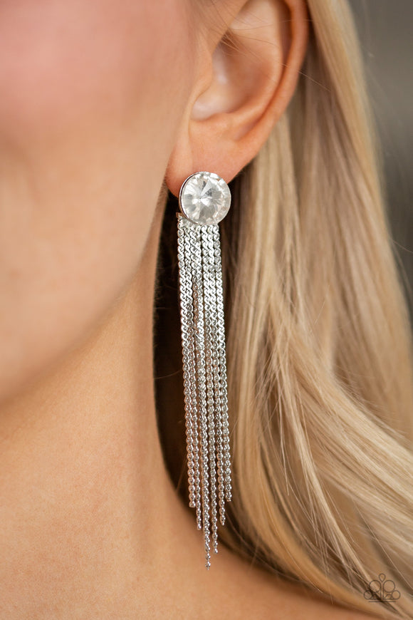 Level Up - White - Paparazzi Accessories - Item #P5PO-WTXX-165XX Flat silver chains stream from the bottom of a solitaire white gem, creating a dramatically tapered fringe. Earring attaches to a standard post fitting.  Sold as one pair of post earrings.