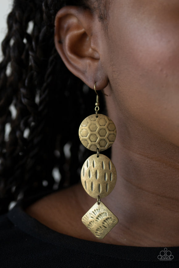 Mixed Movement - Brass - Paparazzi Accessories - Item #P5ST-BRXX-004XX Featuring a variety of earthy textures, three mismatched brass frames delicately link into a free-spirited stacked lure. Earring attaches to a standard fishhook fitting.  Sold as one pair of earrings.